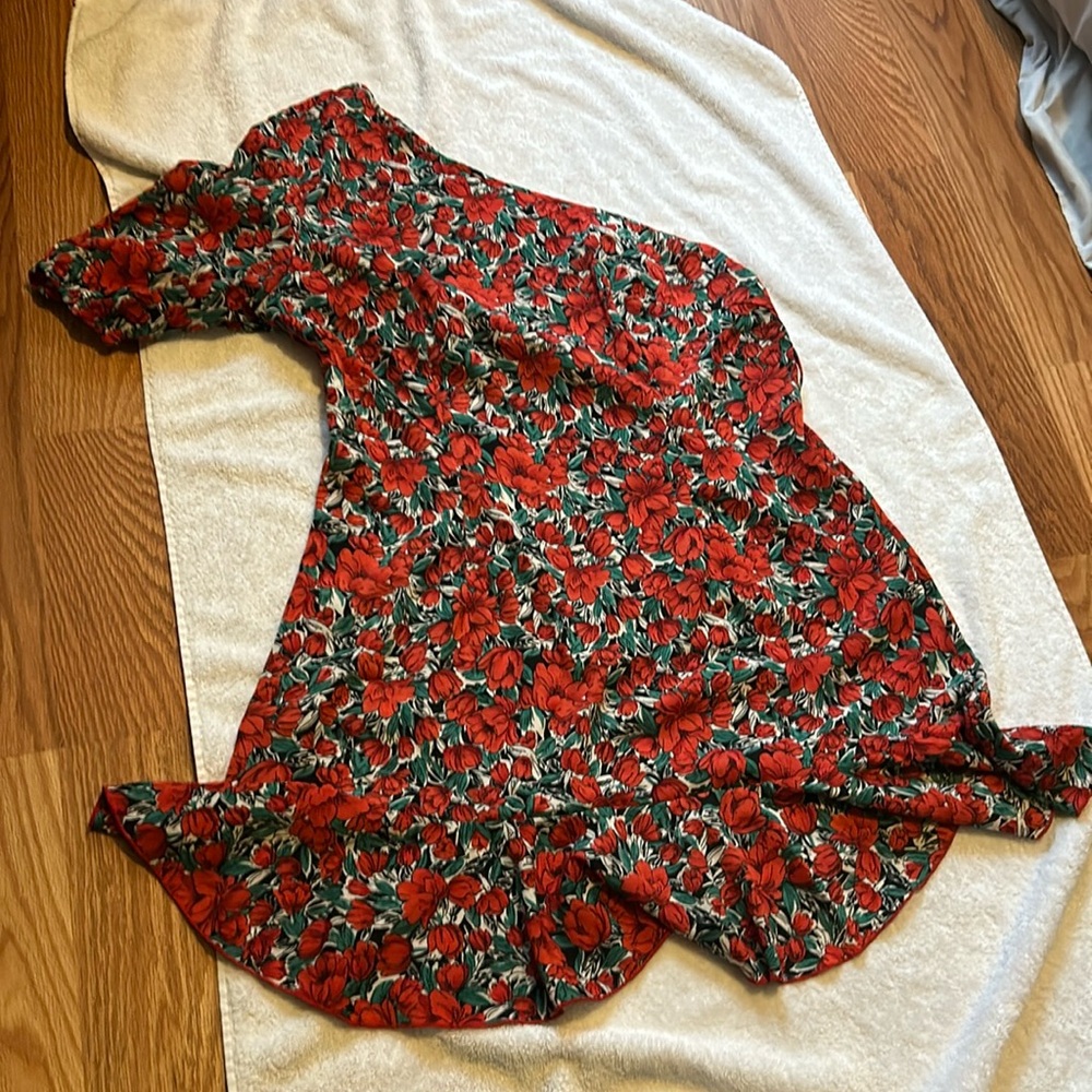 Off the shoulder, one sleeve short dress with red flowers and green leaves